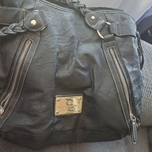 ROSETTI black with zippers and braided straps